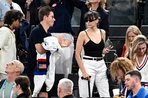 Nina Dobrev with a walking stick and Shaun White look on during the Artistic Gymnastics Women's Qualification on day two of the Olympic Games Paris 2024 at Bercy Arena on July 28, 2024 in Paris, France. Photo by David Niviere/ABACAPRESS.COM