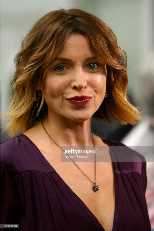 XXX of ZZZZ plays a forehand/backhand in his/her first round match against XXXX of XXXXX during day one of the 2011 Australian Open at Melbourne Park on January 17, 2011 in Melbourne, Australia.