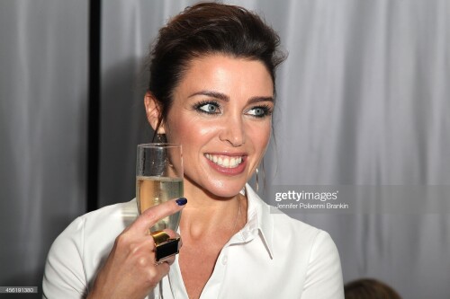 SYDNEY, AUSTRALIA - SEPTEMBER 27:  Dannii Minogue celebrates after the Target Runway show during Mercedes-Benz Fashion Festival Sydney at Sydney Town Hall on September 27, 2014 in Sydney, Australia.  (Photo by Jennifer Polixenni Brankin/WireImage)