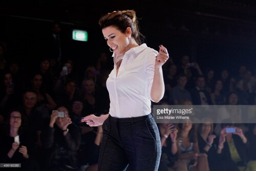 A model prepares backstage ahead of the Target show during Mercedes-Benz Fashion Festival Sydney at Sydney Town Hall on September 27, 2014 in Sydney, Australia.
