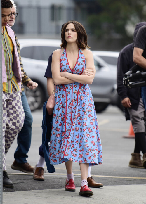 22 April 2025 - EXCLUSIVE.Zoey Deutch films scene for her upcoming film with co star John Slattery in Los Angeles. The American actress was seen getting her makeup touched up while wearing a long puffer coat, floral dress, and red Mary Jane shoes.Credit: GoffPhotos.com   Ref: KGC-339/TIDLA-20**UK Sales Only - No Daily Mail Group/No Sun Group - Exclusive - Newspapers Allrounder - Magazines Double Space Rates - Web/Online Must Call Before Use**